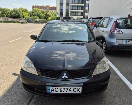Чорний Міцубісі Lancer, об'ємом двигуна 1.58 л та пробігом 314 тис. км за 2800 $, фото 1 на Automoto.ua