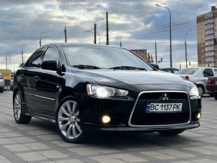 Чорний Міцубісі Lancer, об'ємом двигуна 2 л та пробігом 236 тис. км за 7900 $, фото 1 на Automoto.ua