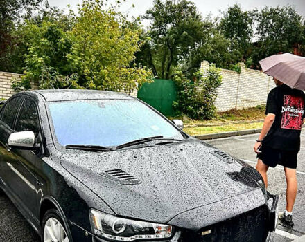 Чорний Міцубісі Lancer, об'ємом двигуна 2 л та пробігом 223 тис. км за 7800 $, фото 1 на Automoto.ua