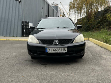 Мицубиси Лансер 2008 в Ужгороде на Automoto.ua Черный Мицубиси Лансер, объемом двигателя 1.58 л и пробегом 192 тыс. км за 4500 $, фото 1 на Automoto.ua