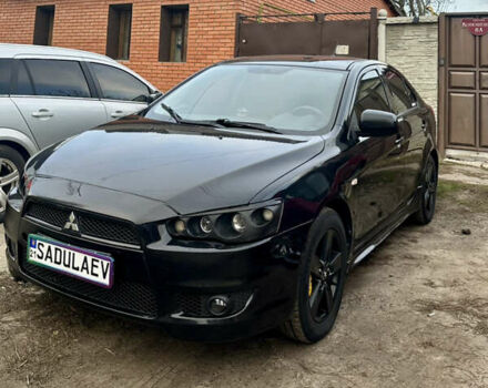 Чорний Міцубісі Lancer, об'ємом двигуна 1.8 л та пробігом 253 тис. км за 4600 $, фото 1 на Automoto.ua