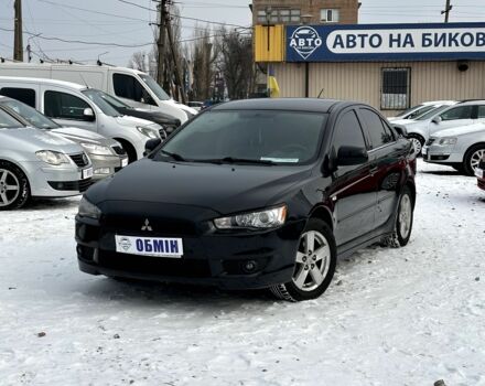 Черный Мицубиси Лансер, объемом двигателя 2 л и пробегом 239 тыс. км за 6900 $, фото 1 на Automoto.ua