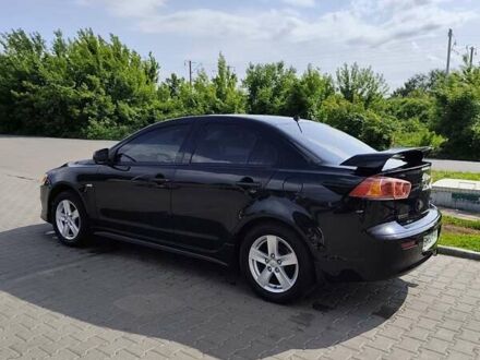 Черный Мицубиси Лансер, объемом двигателя 2 л и пробегом 91 тыс. км за 8500 $, фото 1 на Automoto.ua