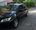 Чорний Міцубісі Lancer, об'ємом двигуна 1.6 л та пробігом 133 тис. км за 6400 $, фото 1 на Automoto.ua