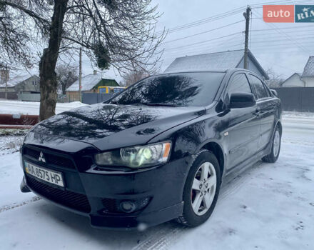 Черный Мицубиси Лансер, объемом двигателя 2 л и пробегом 180 тыс. км за 6999 $, фото 1 на Automoto.ua