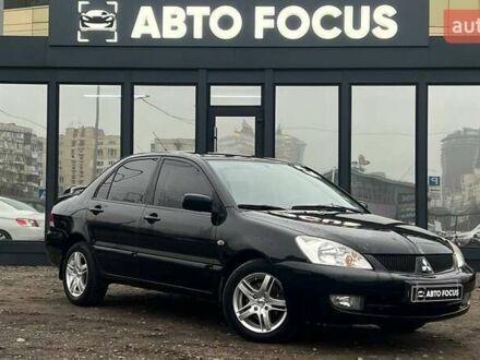 Чорний Міцубісі Lancer, об'ємом двигуна 1.6 л та пробігом 340 тис. км за 6190 $, фото 1 на Automoto.ua