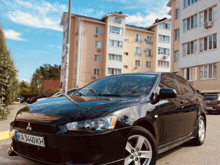 Чорний Міцубісі Lancer, об'ємом двигуна 1.5 л та пробігом 255 тис. км за 6199 $, фото 1 на Automoto.ua