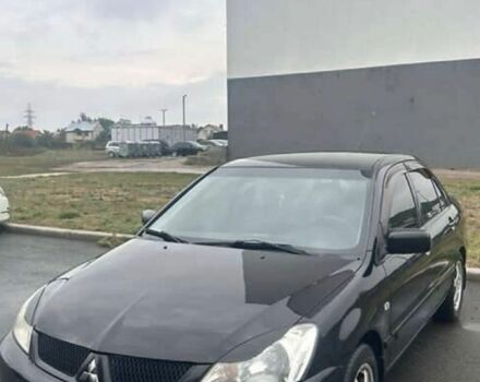 Чорний Міцубісі Lancer, об'ємом двигуна 1.6 л та пробігом 220 тис. км за 4100 $, фото 1 на Automoto.ua