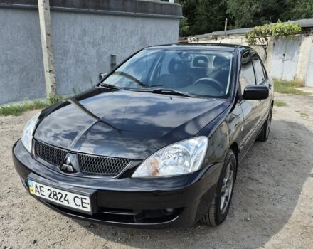 Чорний Міцубісі Lancer, об'ємом двигуна 1.6 л та пробігом 97 тис. км за 5500 $, фото 1 на Automoto.ua