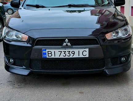 Чорний Міцубісі Lancer, об'ємом двигуна 2 л та пробігом 272 тис. км за 7800 $, фото 1 на Automoto.ua