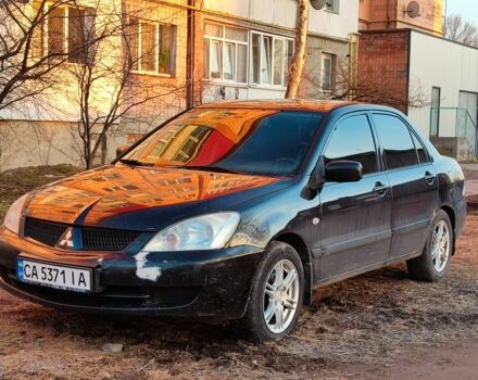 Чорний Міцубісі Lancer, об'ємом двигуна 1.6 л та пробігом 162 тис. км за 3150 $, фото 1 на Automoto.ua
