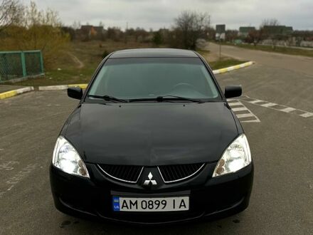 Міцубісі Lancer 2008 у Брусилове на Automoto.ua Чорний Міцубісі Lancer, об'ємом двигуна 1.6 л та пробігом 380 тис. км за 4350 $, фото 1 на Automoto.ua