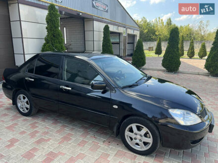 Мицубиси Лансер 2008 в Лозовой на Automoto.ua Черный Мицубиси Лансер, объемом двигателя 1.58 л и пробегом 243 тыс. км за 4800 $, фото 1 на Automoto.ua
