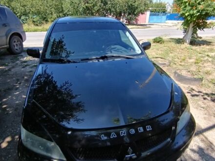 Міцубісі Lancer 2008 у Запоріжжя на Automoto.ua Чорний Міцубісі Lancer, об'ємом двигуна 1.6 л та пробігом 200 тис. км за 4000 $, фото 1 на Automoto.ua