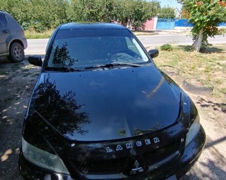 Чорний Міцубісі Lancer, об'ємом двигуна 1.6 л та пробігом 200 тис. км за 4000 $, фото 1 на Automoto.ua