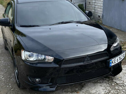 Черный Мицубиси Лансер, объемом двигателя 2 л и пробегом 275 тыс. км за 7700 $, фото 1 на Automoto.ua
