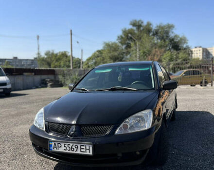 Чорний Міцубісі Lancer, об'ємом двигуна 1.6 л та пробігом 275 тис. км за 3850 $, фото 1 на Automoto.ua