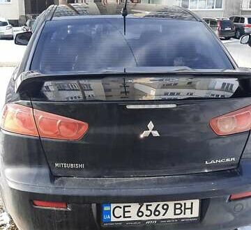 Чорний Міцубісі Lancer, об'ємом двигуна 2 л та пробігом 228 тис. км за 5500 $, фото 1 на Automoto.ua