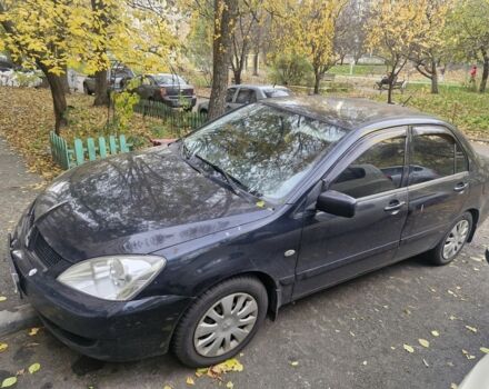 Чорний Міцубісі Lancer, об'ємом двигуна 1.6 л та пробігом 243 тис. км за 2900 $, фото 1 на Automoto.ua