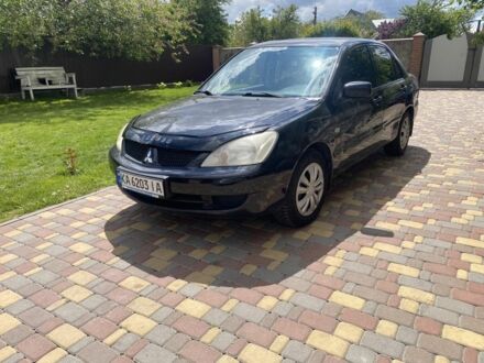 Міцубісі Lancer 2008 у Бобровице на Automoto.ua Чорний Міцубісі Lancer, об'ємом двигуна 1.6 л та пробігом 200 тис. км за 1650 $, фото 1 на Automoto.ua