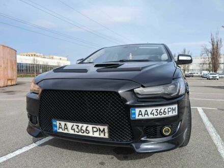 Чорний Міцубісі Lancer, об'ємом двигуна 2 л та пробігом 250 тис. км за 10500 $, фото 1 на Automoto.ua