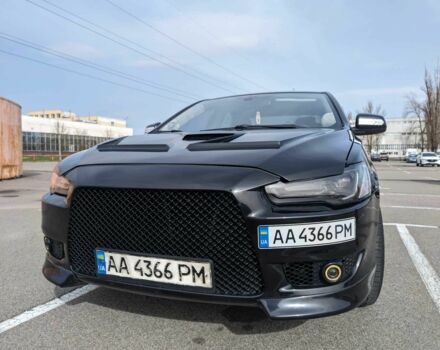 Чорний Міцубісі Lancer, об'ємом двигуна 2 л та пробігом 250 тис. км за 10500 $, фото 1 на Automoto.ua