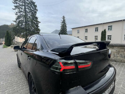 Міцубісі Lancer 2008 у Кременце на Automoto.ua Чорний Міцубісі Lancer, об'ємом двигуна 2 л та пробігом 165 тис. км за 6900 $, фото 1 на Automoto.ua