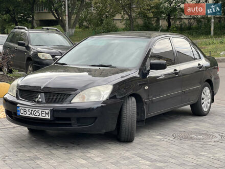 Мицубиси Лансер 2008 в Киеве на Automoto.ua Черный Мицубиси Лансер, объемом двигателя 1.58 л и пробегом 163 тыс. км за 5100 $, фото 1 на Automoto.ua