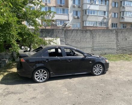 Чорний Міцубісі Lancer, об'ємом двигуна 2 л та пробігом 140 тис. км за 7350 $, фото 1 на Automoto.ua