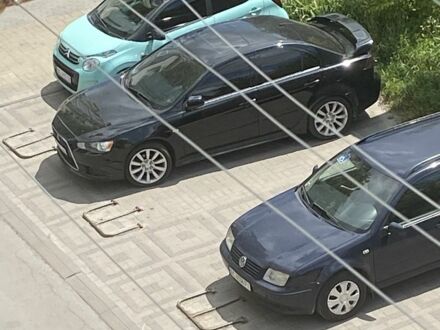 Мицубиси Лансер 2008 в Львове на Automoto.ua Черный Мицубиси Лансер, объемом двигателя 2 л и пробегом 235 тыс. км за 5000 $, фото 1 на Automoto.ua