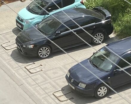 Чорний Міцубісі Lancer, об'ємом двигуна 2 л та пробігом 235 тис. км за 5000 $, фото 1 на Automoto.ua