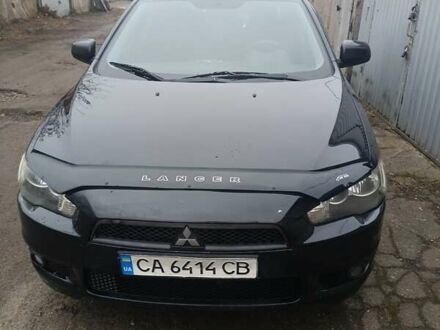 Чорний Міцубісі Lancer, об'ємом двигуна 2 л та пробігом 192 тис. км за 6350 $, фото 1 на Automoto.ua