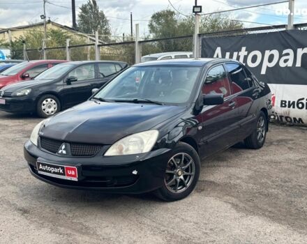 Мицубиси Лансер 2008 в Запорожье на Automoto.ua Черный Мицубиси Лансер, объемом двигателя 1.6 л и пробегом 316 тыс. км за 4290 $, фото 1 на Automoto.ua