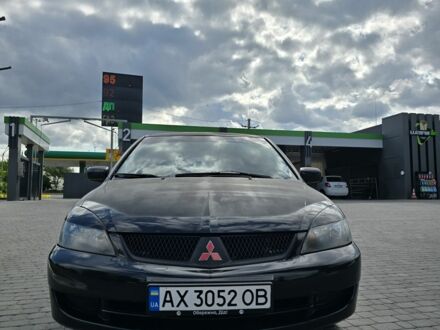 Мицубиси Лансер 2008 в Харькове на Automoto.ua Черный Мицубиси Лансер, объемом двигателя 1.6 л и пробегом 223 тыс. км за 3400 $, фото 1 на Automoto.ua