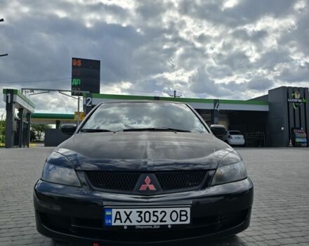 Чорний Міцубісі Lancer, об'ємом двигуна 1.6 л та пробігом 223 тис. км за 3400 $, фото 1 на Automoto.ua