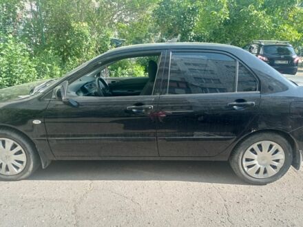 Міцубісі Lancer 2008 у Измаиле на Automoto.ua Чорний Міцубісі Lancer, об'ємом двигуна 1.6 л та пробігом 211 тис. км за 3500 $, фото 1 на Automoto.ua