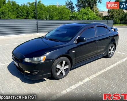 Чорний Міцубісі Lancer, об'ємом двигуна 2 л та пробігом 236 тис. км за 5500 $, фото 1 на Automoto.ua