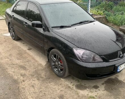 Чорний Міцубісі Lancer, об'ємом двигуна 1.6 л та пробігом 214 тис. км за 5200 $, фото 1 на Automoto.ua