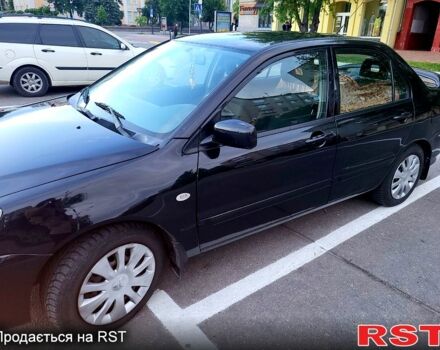 Чорний Міцубісі Lancer, об'ємом двигуна 1.6 л та пробігом 320 тис. км за 4400 $, фото 1 на Automoto.ua