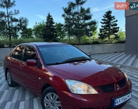 Черный Мицубиси Лансер, объемом двигателя 1.6 л и пробегом 256 тыс. км за 4800 $, фото 1 на Automoto.ua