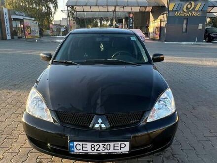 Чорний Міцубісі Lancer, об'ємом двигуна 1.6 л та пробігом 201 тис. км за 4800 $, фото 1 на Automoto.ua