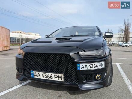 Чорний Міцубісі Lancer, об'ємом двигуна 2 л та пробігом 240 тис. км за 10500 $, фото 1 на Automoto.ua