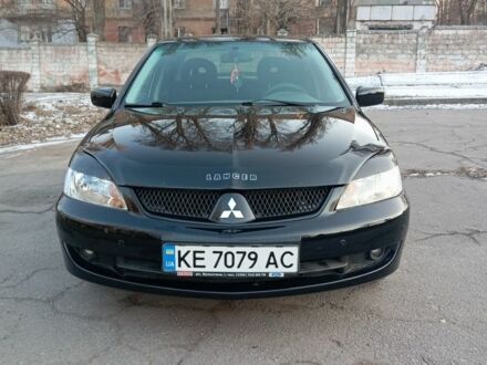 Мицубиси Лансер 2008 в Каменское - Днепродзержинск на Automoto.ua Черный Мицубиси Лансер, объемом двигателя 1.6 л и пробегом 180 тыс. км за 4699 $, фото 1 на Automoto.ua