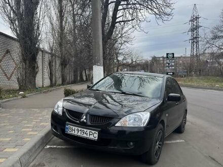 Міцубісі Lancer 2008 у Одесі на Automoto.ua Чорний Міцубісі Lancer, об'ємом двигуна 1.58 л та пробігом 211 тис. км за 4800 $, фото 1 на Automoto.ua