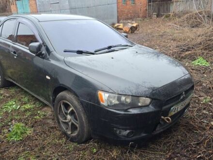 Черный Мицубиси Лансер, объемом двигателя 1.5 л и пробегом 300 тыс. км за 2500 $, фото 1 на Automoto.ua