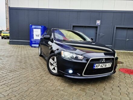 Черный Мицубиси Лансер, объемом двигателя 2 л и пробегом 240 тыс. км за 7450 $, фото 1 на Automoto.ua