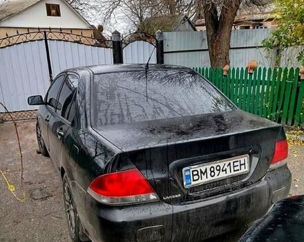 Чорний Міцубісі Lancer, об'ємом двигуна 1.6 л та пробігом 126 тис. км за 4500 $, фото 1 на Automoto.ua