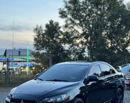 Чорний Міцубісі Lancer, об'ємом двигуна 2 л та пробігом 200 тис. км за 3850 $, фото 1 на Automoto.ua