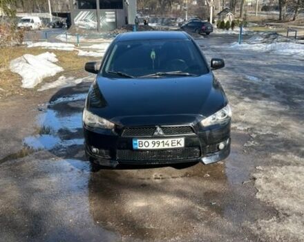 Черный Мицубиси Лансер, объемом двигателя 2 л и пробегом 25 тыс. км за 5700 $, фото 1 на Automoto.ua