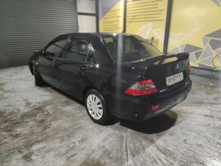 Міцубісі Lancer 2008 у Кам'янське (Дніпродзержинськ) на Automoto.ua Чорний Міцубісі Lancer, об'ємом двигуна 1.6 л та пробігом 80 тис. км за 1919 $, фото 1 на Automoto.ua